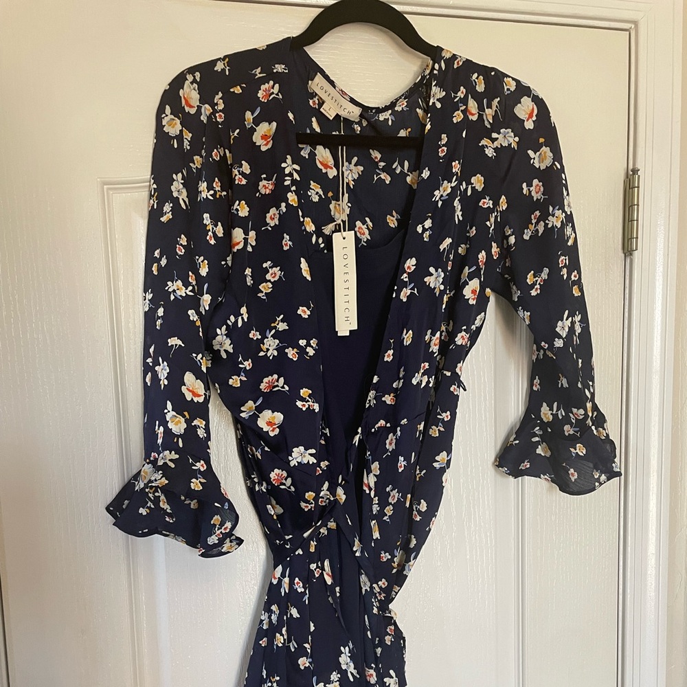 NWT from Vici Dolls brand is Lovestitch wrap dress sz L